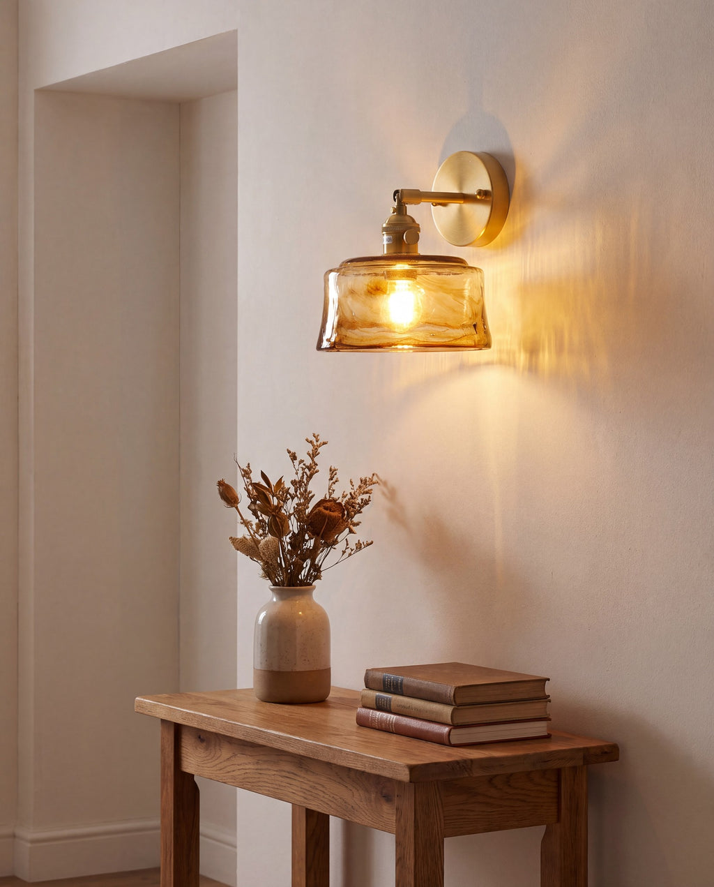 Notodden drum wall light glowing in a hallway