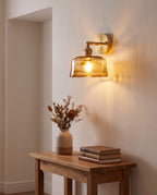 Notodden drum wall light glowing in a hallway