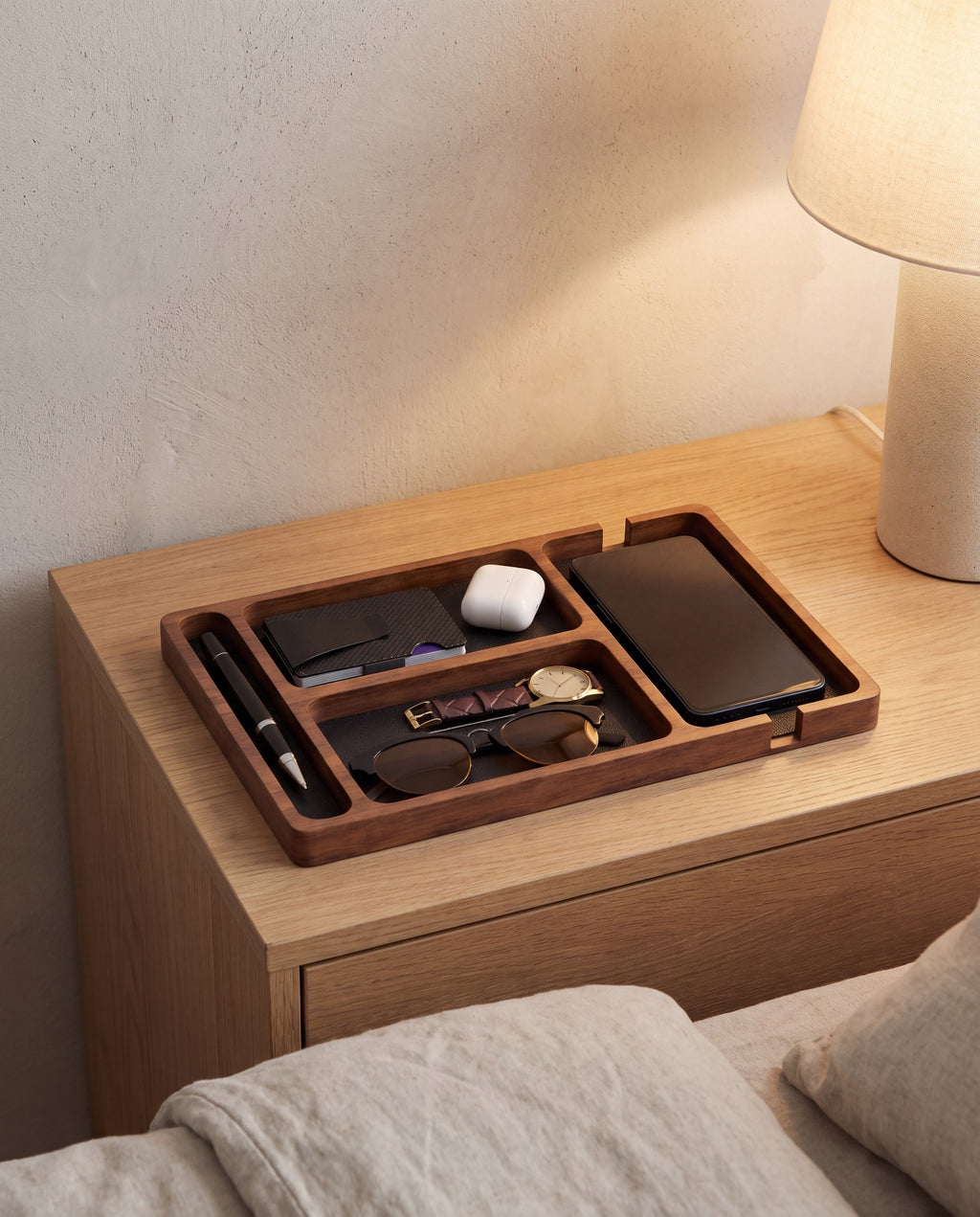 Ronneby valet tray on a bedside table