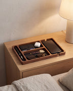 Ronneby valet tray on a bedside table