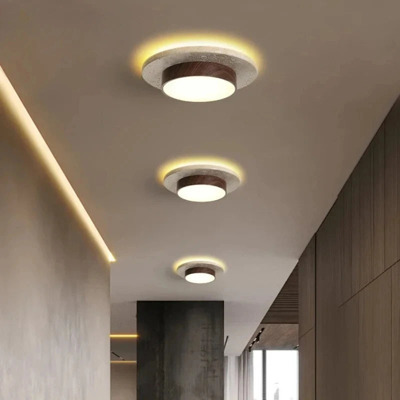 Tilbury ceiling lights lit along a hallway ceiling