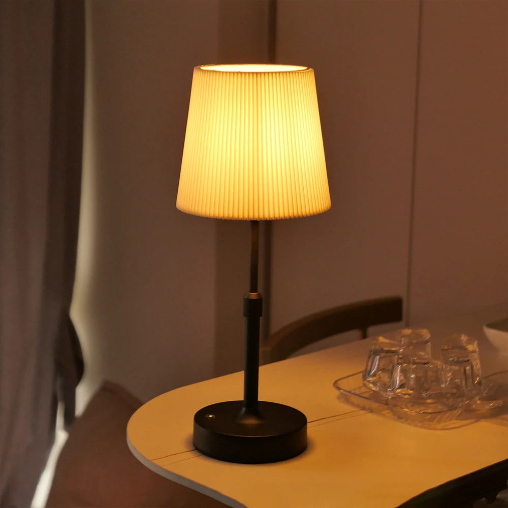 Black Tallberg cordless lamp on a table