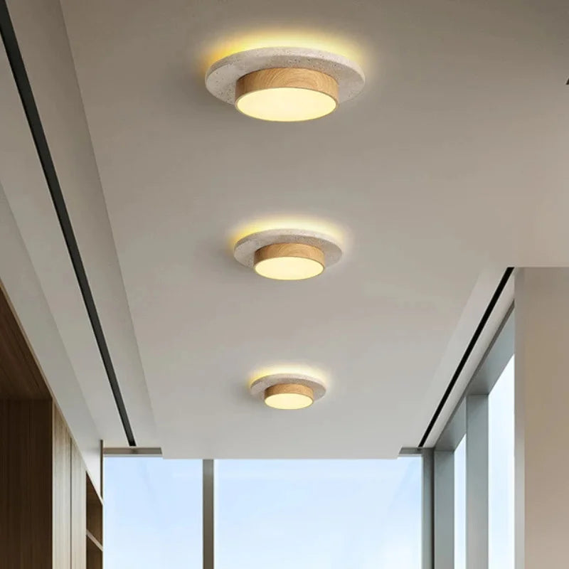 Tilbury travertine and walnut ceiling lights in a bright corridor