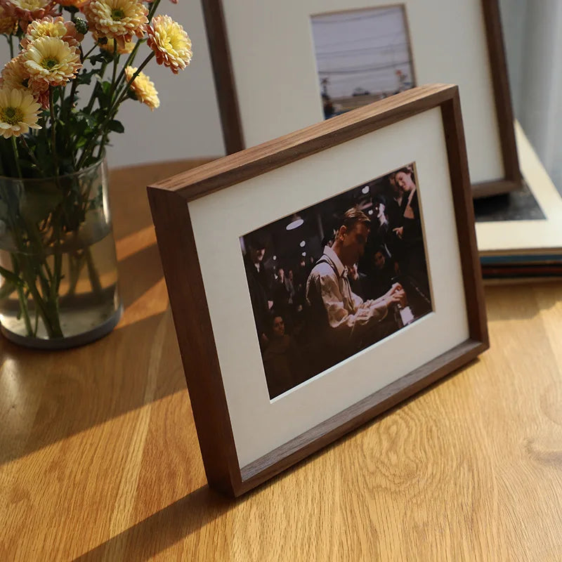 Bautzen walnut frame standing on a desk