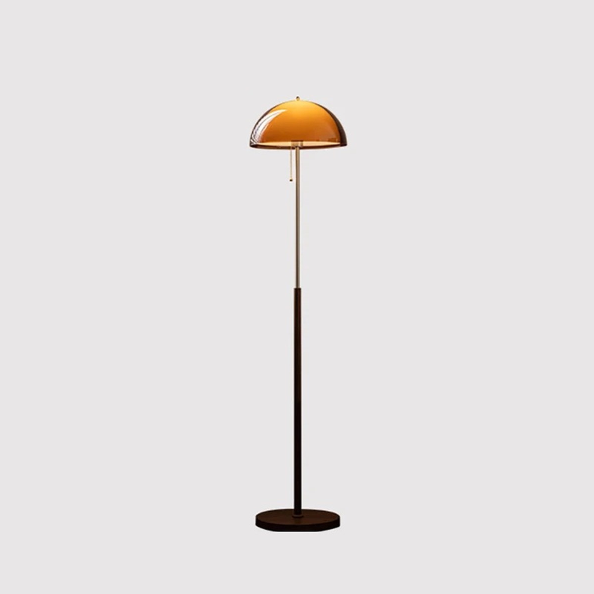 Aalen floor lamp full height product photo showing the amber shade, metal rod, walnut tone column and round base
