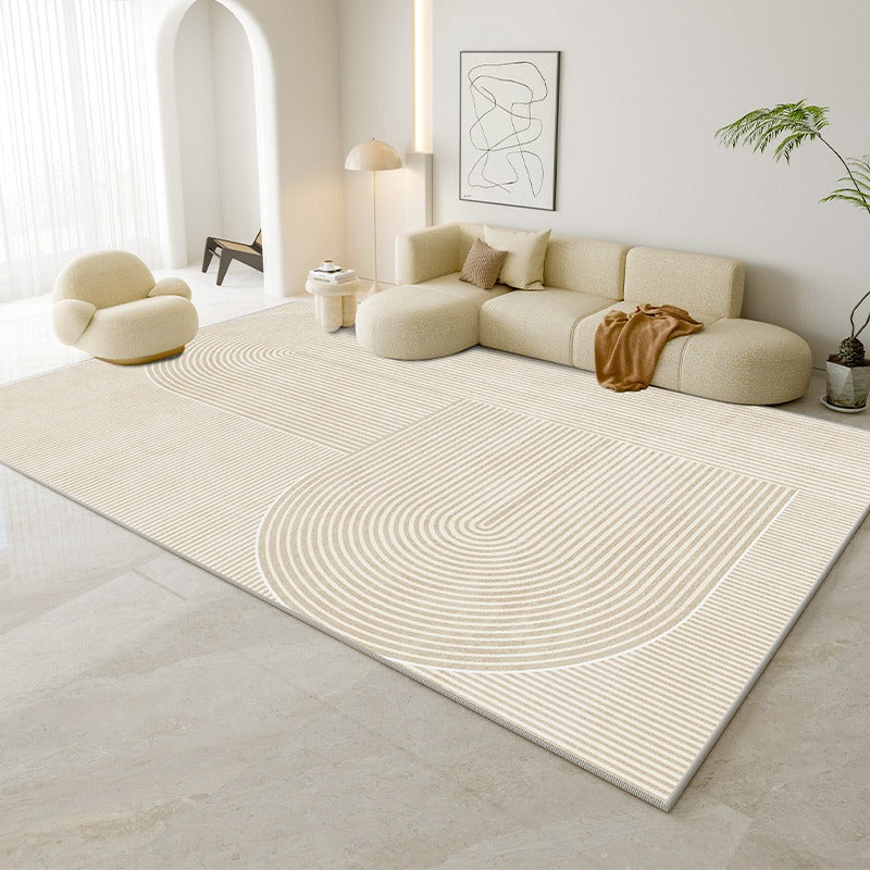 Ahlbeck cream line rug with a wide arc in a bright living room