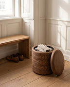 Coffee Brown Amrum storage stool open in a hallway with a scarf and gloves tucked inside