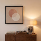 Bacharach record frame above a walnut sideboard with a turntable and records