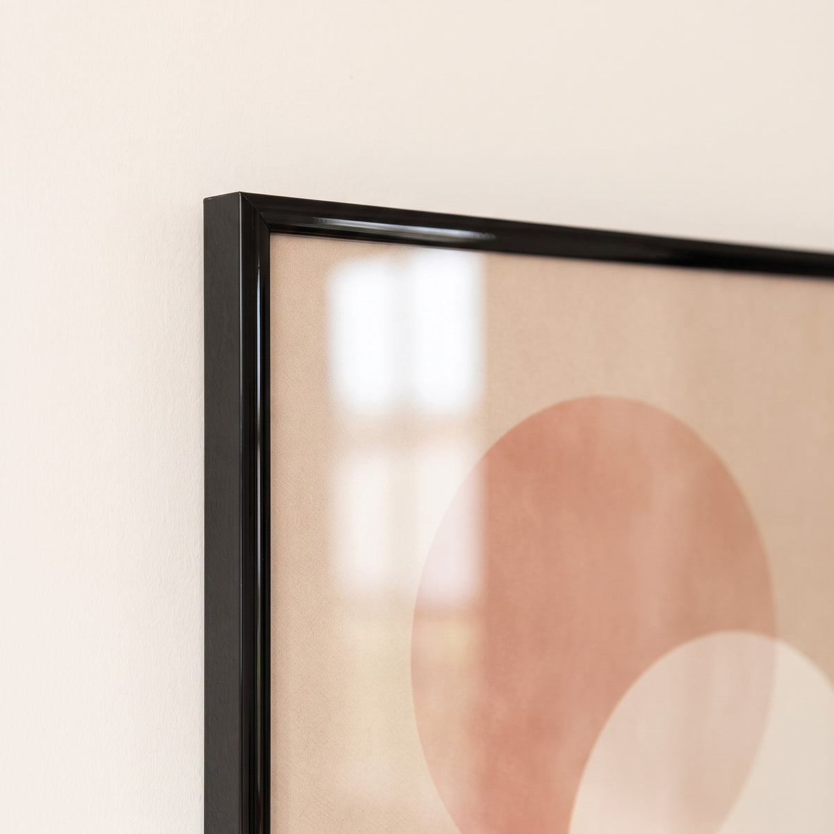 Close up of the Bacharach frame gloss black moulding and corner