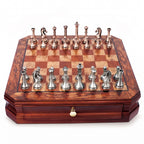 Brugge metal chess set on a burl wood effect board with drawer, on white