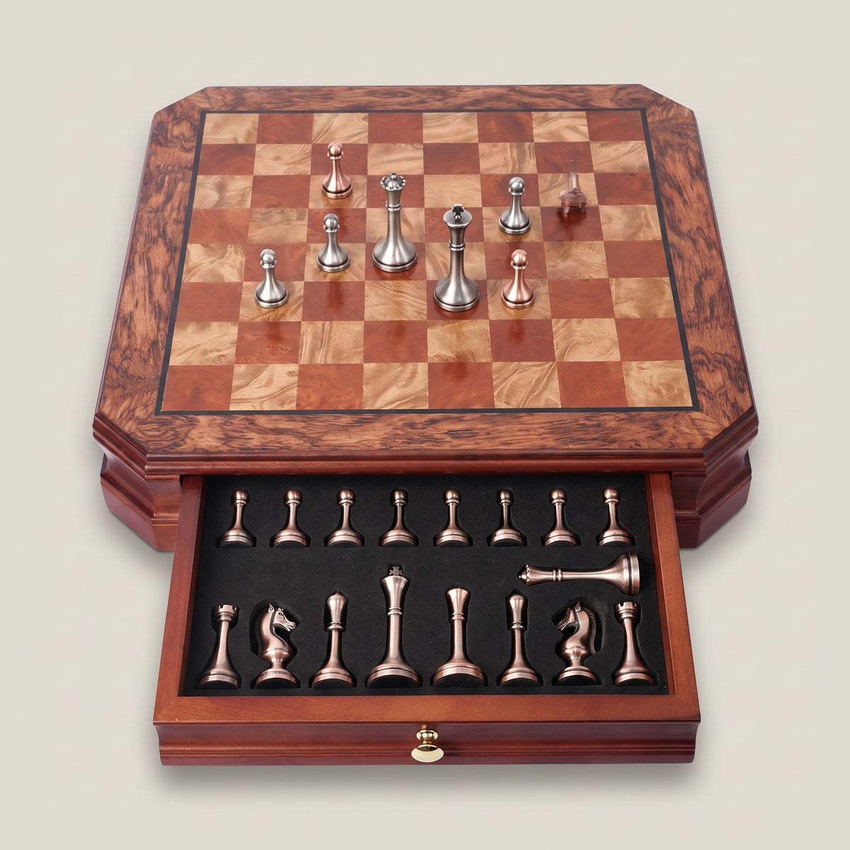 Brugge chess set with its foam lined drawer open, holding the metal pieces