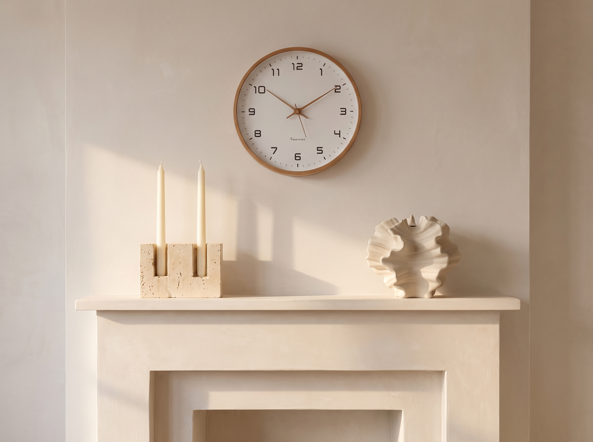 A mantel with the Helmsley candle holder, the Cheltenham vase and the Selby wall clock