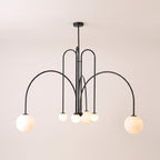 Eckernforde opal globe chandelier in Black, lit, on a light studio background
