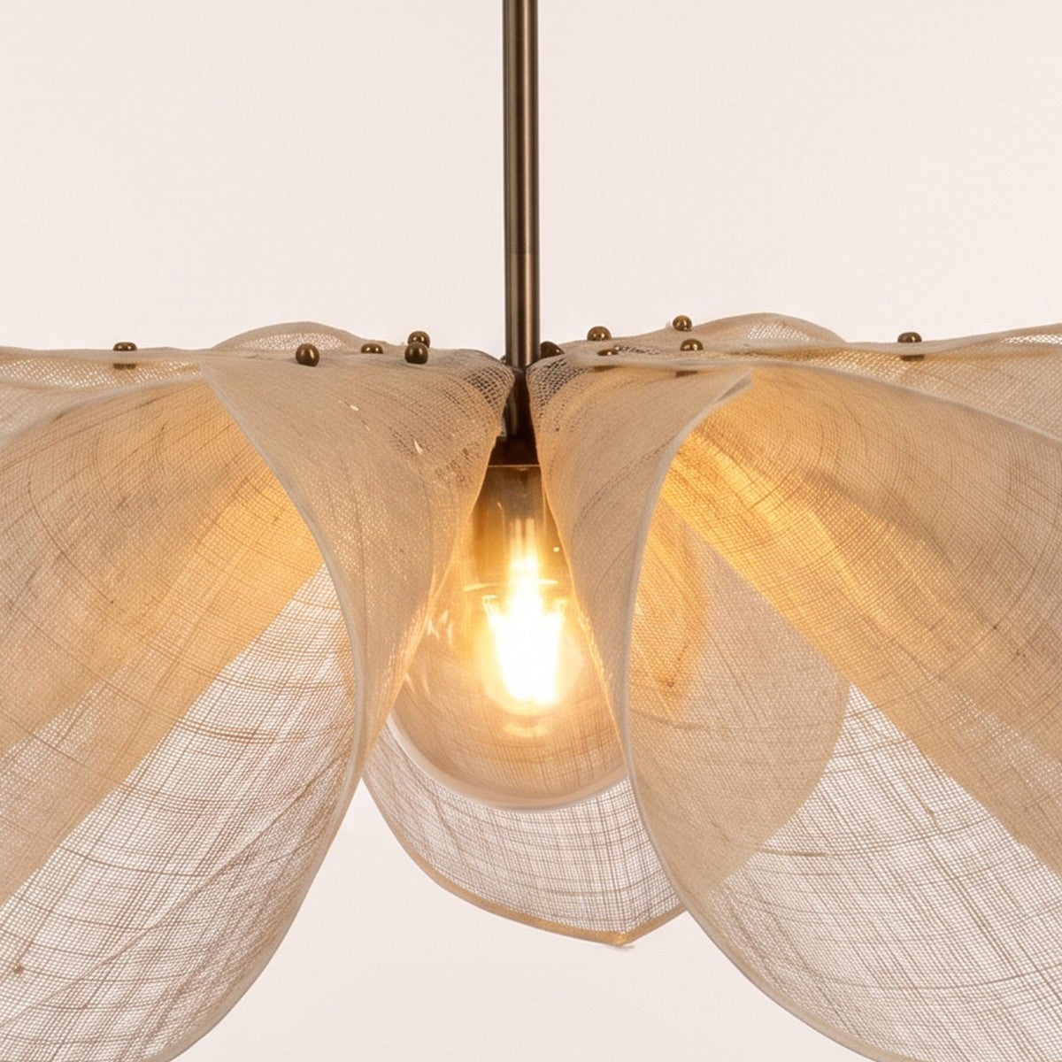 Close up of the Fussen sheer fabric petals, small studs and bulb