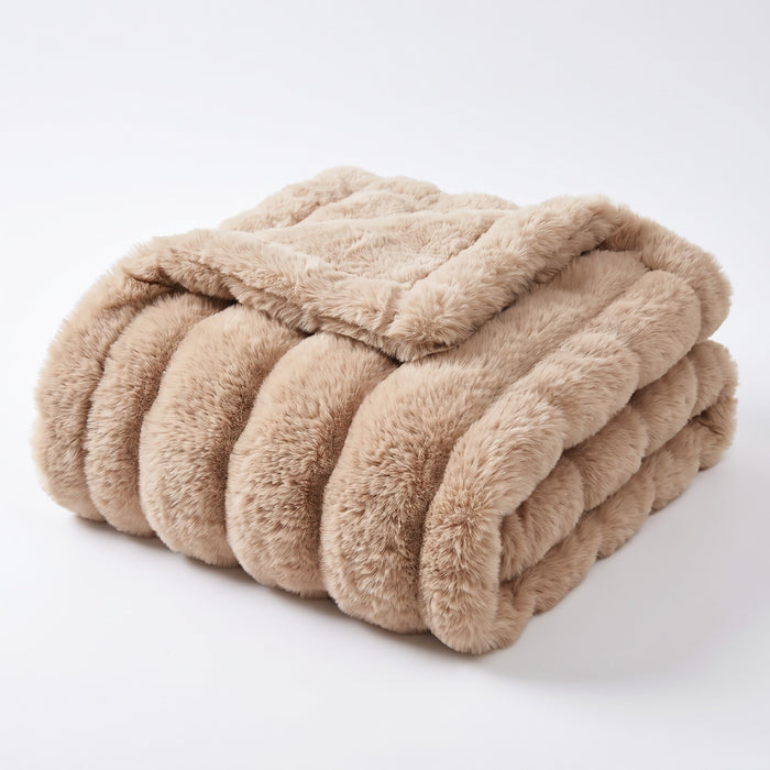 Gent ruched faux fur throw in camel, folded, on white