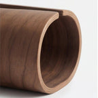 Close up of the curved walnut tone grain on the Haarlem tissue box holder, product photo