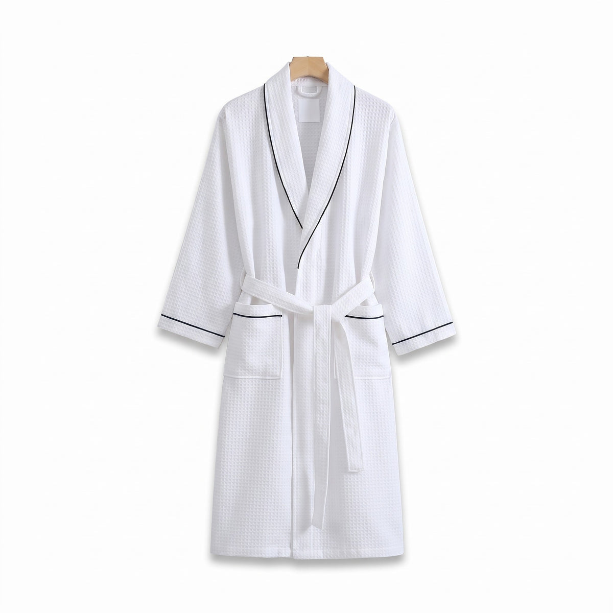Heringsdorf cotton waffle robe in White with black piping on a white background