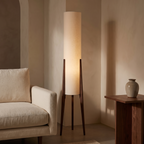Wetherby floor lamp beside a cream linen sofa