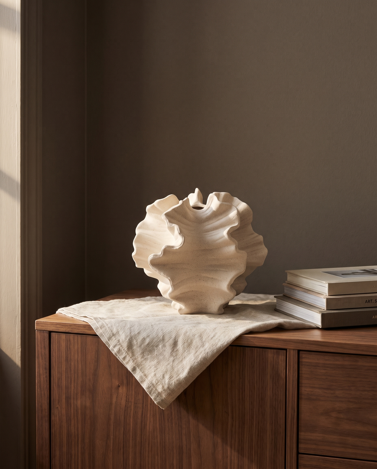 Cheltenham sculptural vase on a walnut sideboard