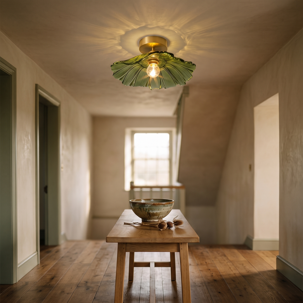 Melford green petal glass ceiling light lit in an English entrance hall