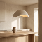 Rothwell sculpted cream dome pendant light above a pale oak kitchen island