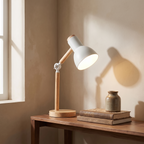 Elmsworth white and wood desk lamp on a walnut hallway console table