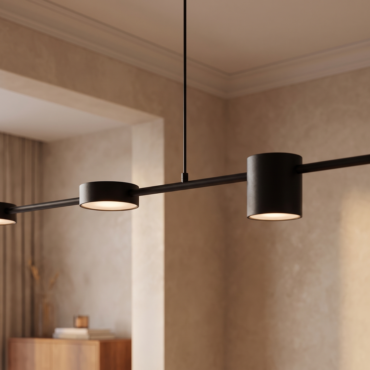 Langford black linear pendant light seen from below with its suspension cable