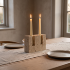 Helmsley travertine candle holder on a dining table