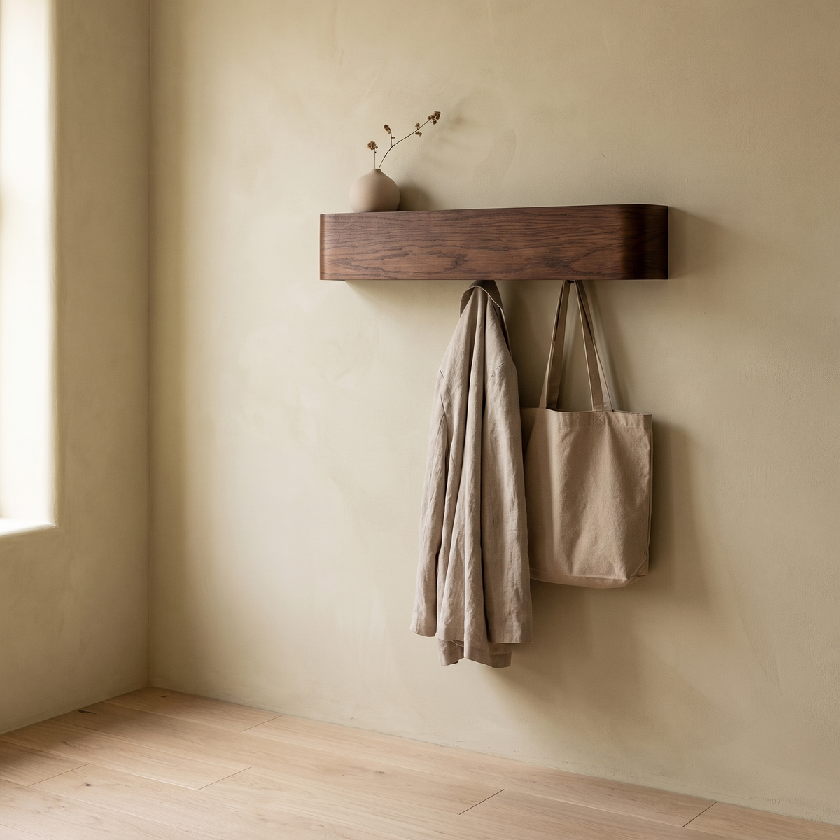 Eastnor walnut wall shelf in a hallway with keys and a bag