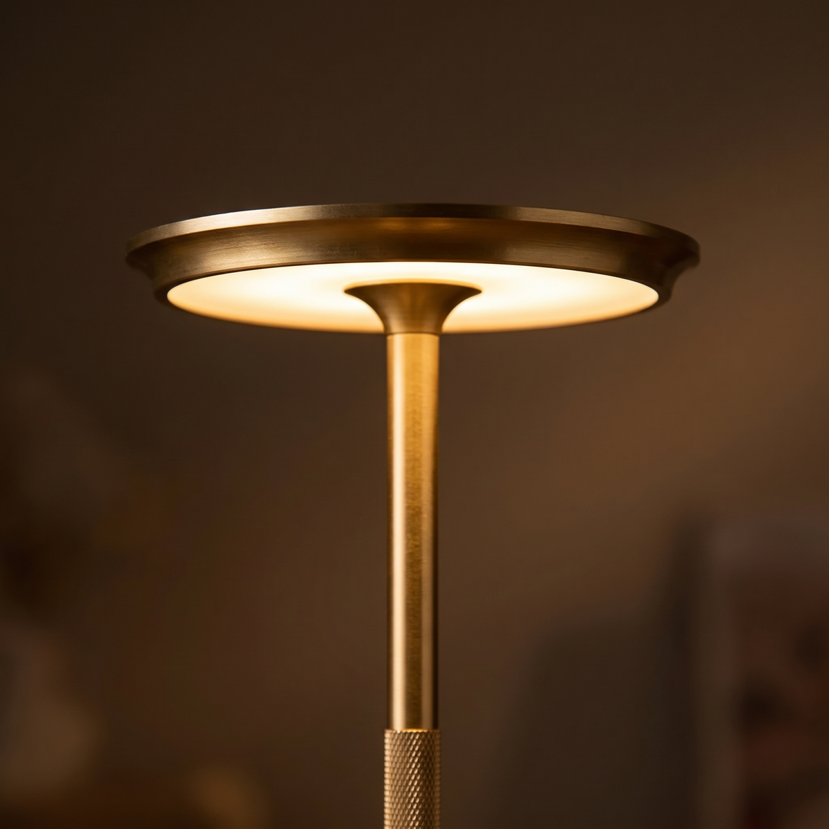 Padstow lamp detail, brushed gold disc shade lit