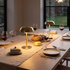Two Skara lamps on a dining table