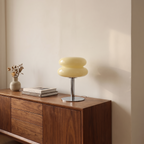 Cream Fulda lamp on a walnut sideboard