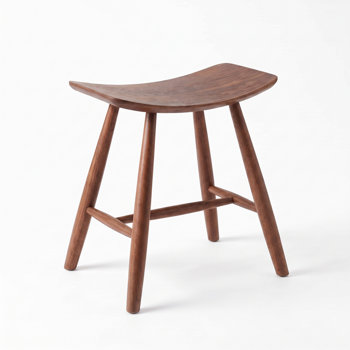 Herning solid wood saddle stool in walnut, white background