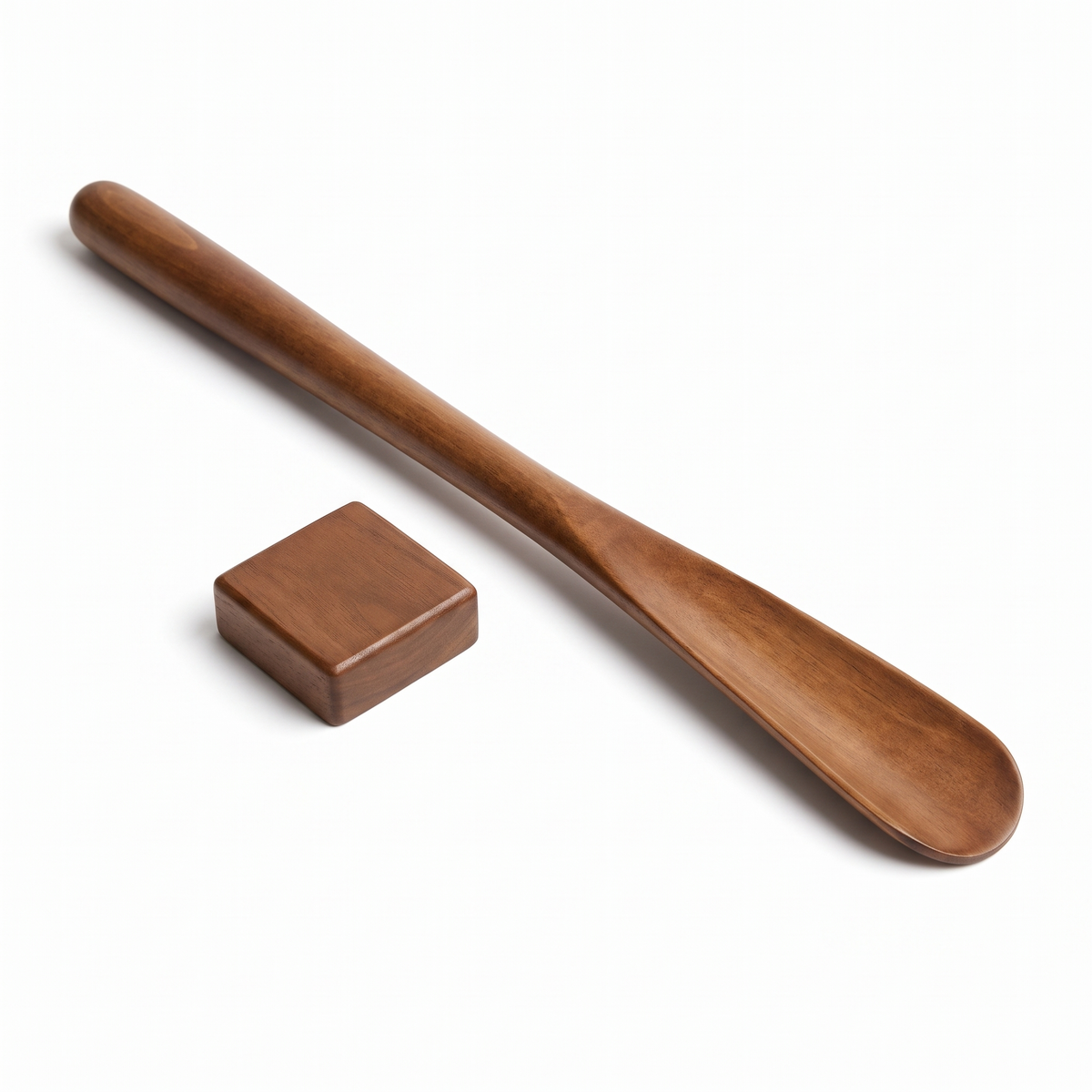 Herford long shoe horn in walnut stain with its wall block on white