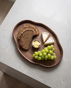 Trier tray with bread, cheese and grapes