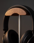 Close up of the Marburg walnut cradle with headphones