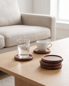 Aalborg coasters on a coffee table