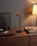 Marburg headphone stand on a walnut sideboard beside a record player