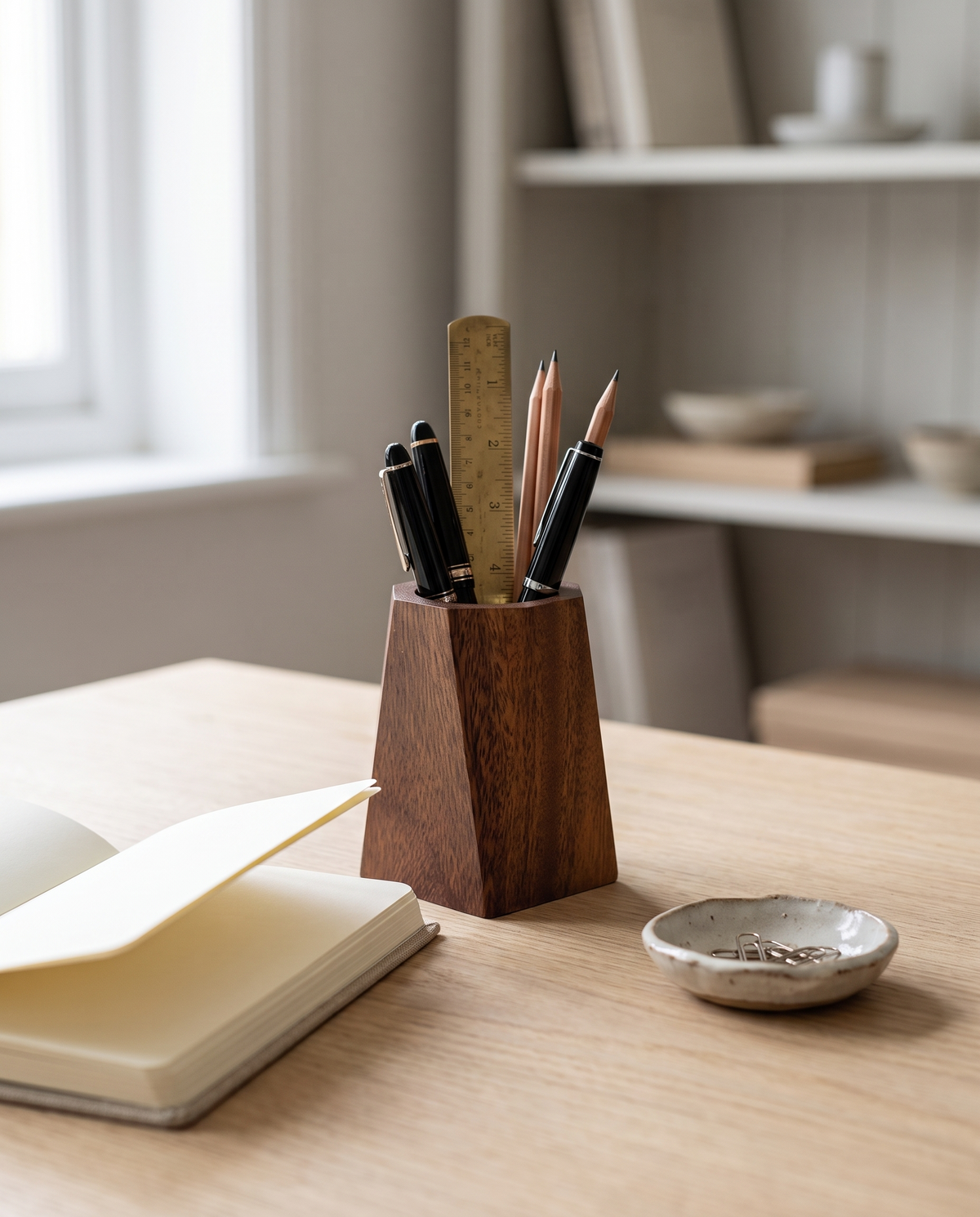 Rostock pen pot with pens on an oak desk
