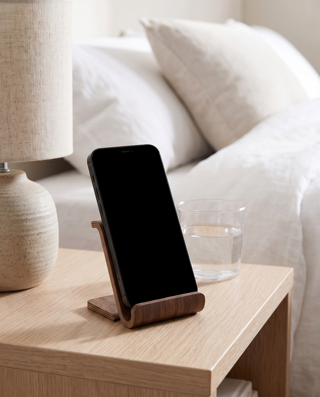 Hameln phone stand on a bedside table