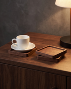 Aalborg square walnut coasters with an espresso cup