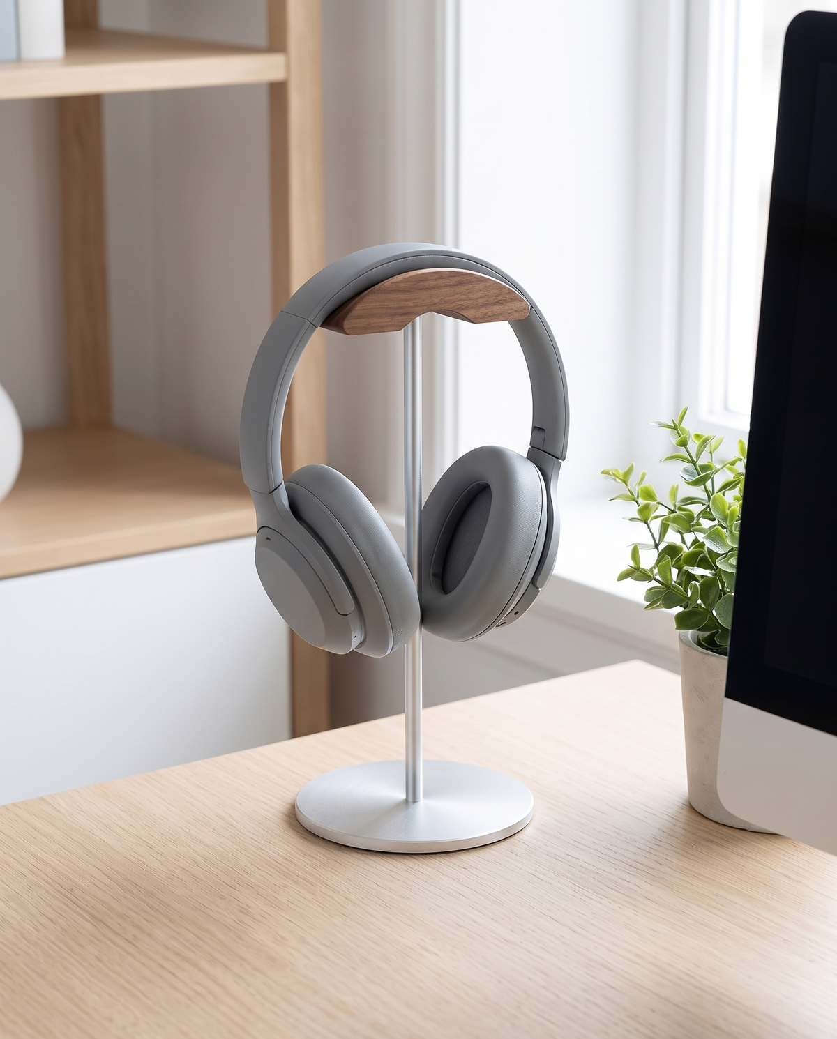 Marburg silver headphone stand on a white oak desk
