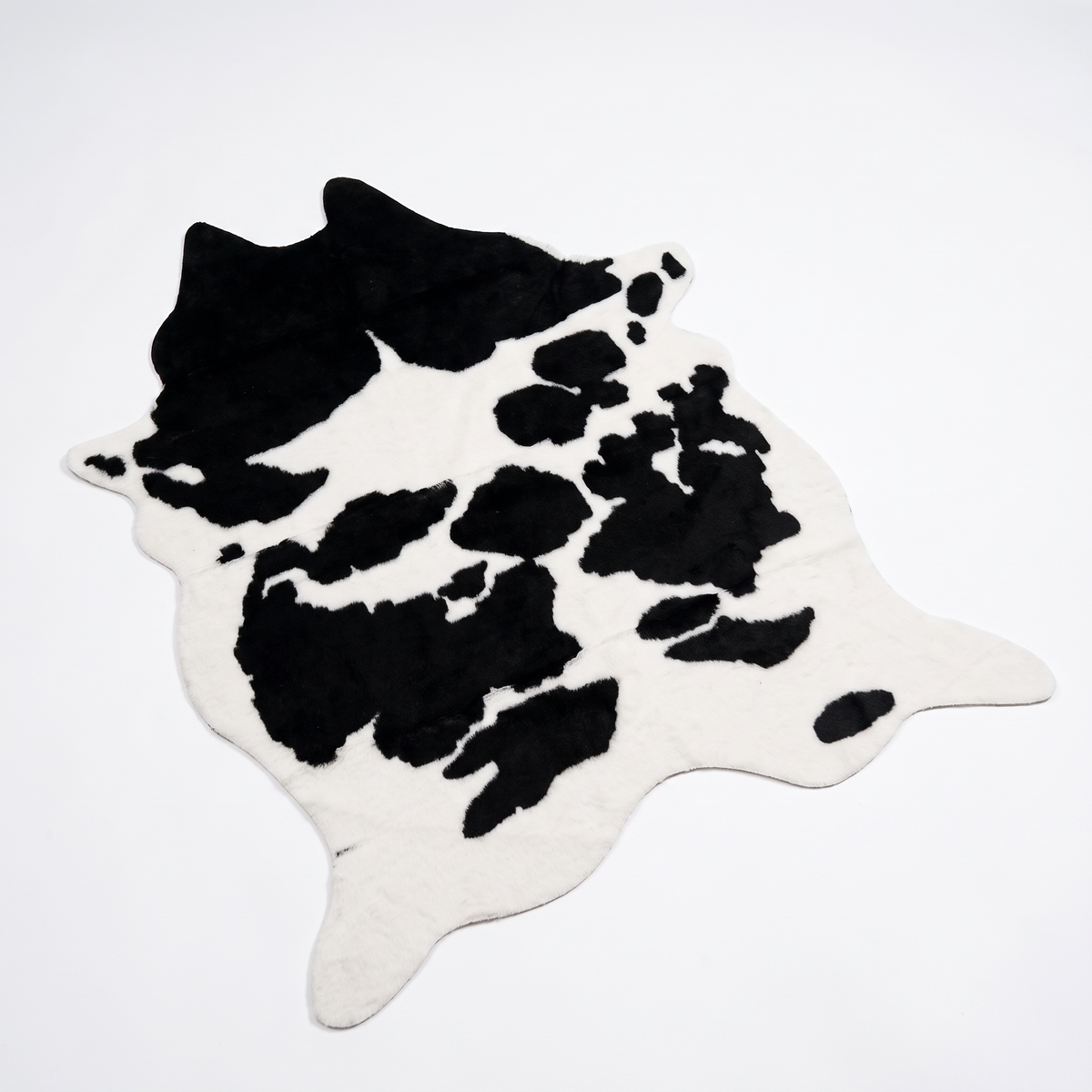 Lysekil Faux Cowhide Rug, Black and White on white