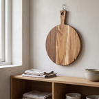 Grimstad Round Acacia Board in a room