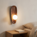 Marstal wall light beside a bed