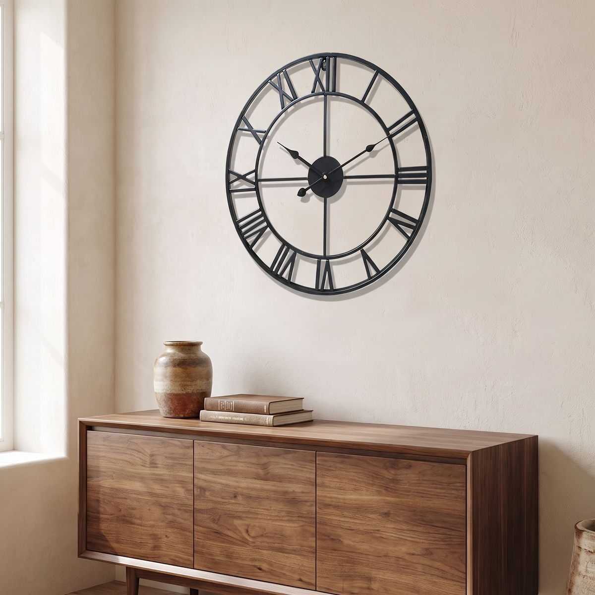 Haslev black wall clock above a walnut sideboard