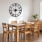 Haslev black wall clock in a dining room