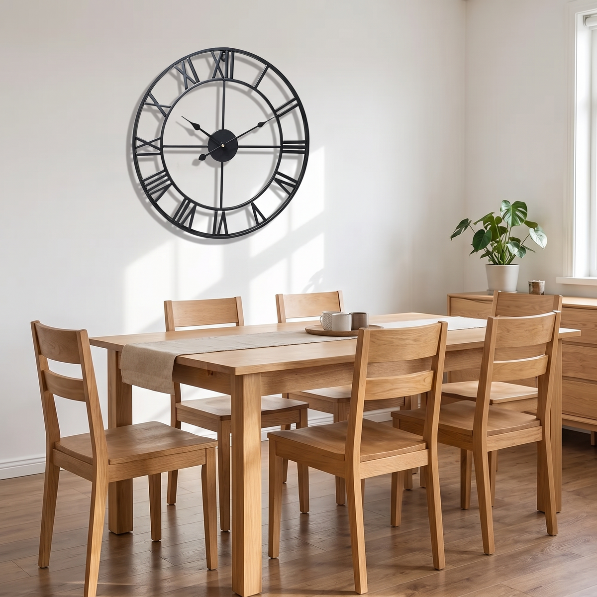 Haslev black wall clock in a dining room