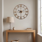 Haslev gold wall clock in a hallway