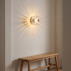 Lidkoping wall light glowing in a hallway